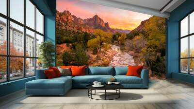 The rays of the sun illuminate red cliffs and river. Park at sunset. A beautiful pink sky. Zion National Park, Utah, USA Wall mural