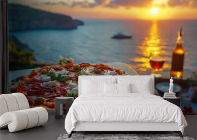 An appetizing pizza placed on a table overlooking the Mediterranean Sea during a scenic sunset, with wine. Wall mural