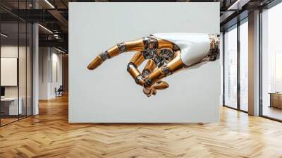 Close-up of a futuristic golden robotic hand with intricate mechanical details, pointing forward, symbolizing innovation and technology. Wall mural