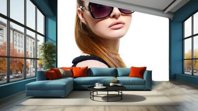 Fashion portrait of young pretty woman wearing sunglasses over w Wall mural