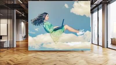 Hovering in air. Surprised girl ruffle dress levitating, looking at laptop screen shocked amazed, surfing web social networks while flying in mid-air. collage composition on day cloudy blue sky Wall mural