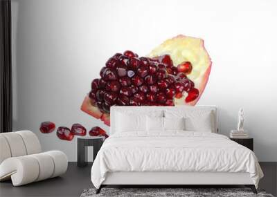 Sliced Red pomegranate isolated on white background. Wall mural