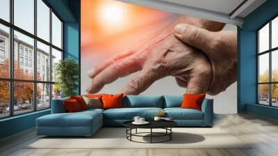 Trigger Finger problems. Woman’s hand with red spot o fingers as suffer from Carpal tunnel syndrome. The symptoms of tingling, numbness, weakness, or pain of the fingers and wrist. Wall mural