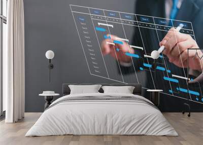 Businessperson managing project schedule with digital Gantt chart. Modern project planning, task management, progress tracking. Professional workspace, strategic efficiency, futuristic technology. Wall mural