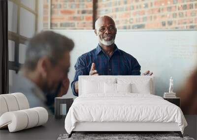 getting back to the matter at hand.... cropped shot of a mature businessman giving a presentation in Wall mural