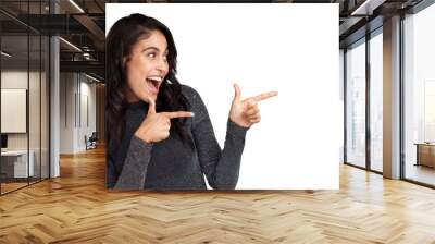 PNG Shot of a beautiful young woman pointing at copy space against a grey background Wall mural