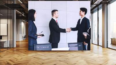 shake hands and successful negotiation of business people Wall mural