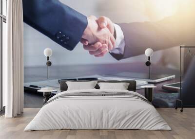 successful negotiate and handshake concept, two businessman shake hand with parthner to celebration partnership and teamwork, business deal Wall mural