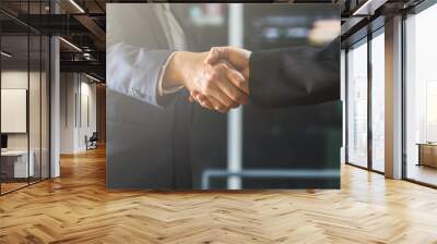 successful negotiate and handshake concept, two businessman shake hand with parthner to celebration partnership and teamwork, business deal Wall mural