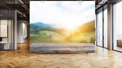 wood table on green nature background Wall mural