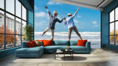 Asian couple senior elder retire resting relax dancing at sunset beach honeymoon family together happiness people lifestyle, Slow motion footage Wall mural