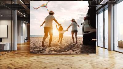 Happy Family with car travel road trip. summer vacation in car in the sunset, Dad, mom and daughter happy traveling enjoy together driving in holidays, people lifestyle ride by automobile. Wall mural