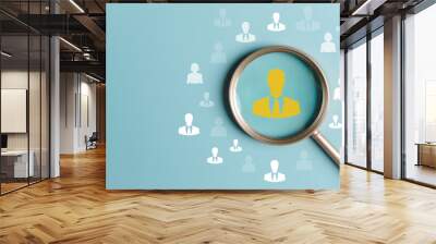 HRM or Human Resource Management, Magnifier glass focus to manager icon which is among staff icons for human development recruitment leadership and customer target group concept. Wall mural