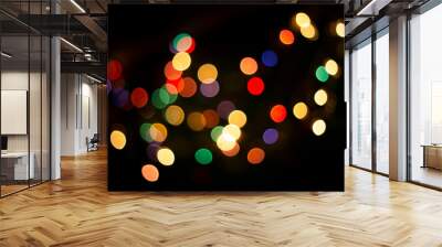 blur light bokeh color red green yellow on background black. Wall mural