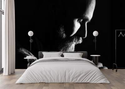 bearded man praying Wall mural