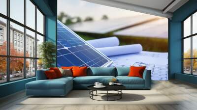 Construction project on the background of solar batteries, image of green energy Wall mural