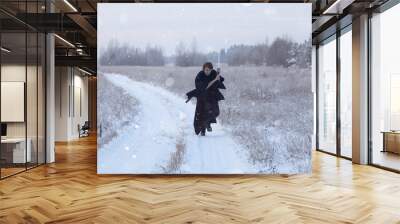 running samurai wearing a kimono in a winter field dressed Wall mural