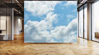 white clouds on blue sky background, abstract seasonal wallpaper, sunny day atmosphere Wall mural