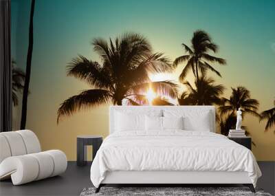 beautiful tropical sunset. silhouettes of palm trees background Wall mural