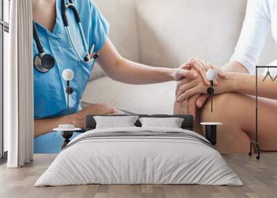 Female Patient Being Reassured By Doctor In Hospital Room Wall mural