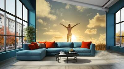 Happy woman with arms in air feeling free. Wall mural