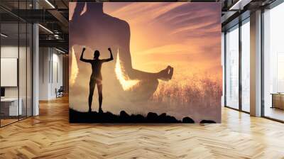 Healthy mind body and spirit. Strong young woman flexing looking to the sunrise. Meditation at sunset.  Wall mural