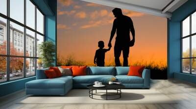 Loving father walking side by side with son holding hands.  Wall mural