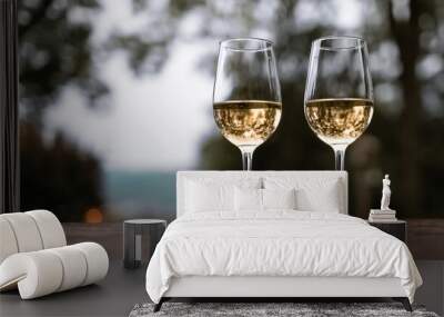 Wine glasses and a nature view Wall mural