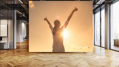 Woman feeling, positive, joyful, inspired, and optimistic.  Wall mural