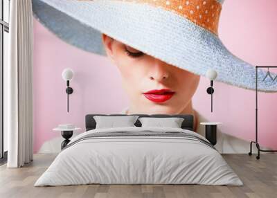 Woman wearing hat. Fashion studio portrait Wall mural