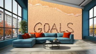 Word goals isolated written on sand beach. Vision, success, and goal setting concept  Wall mural