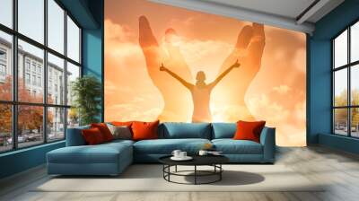 young happy woman with hand outstretched feeling positive, and mentally energized. worship, and spirituality concept  Wall mural