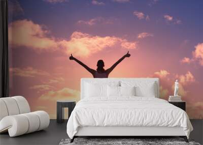 Young woman feeling positive, and happy. Wall mural