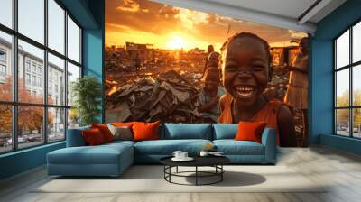 happy black children playing in the slums, smiling and laughing at camera, in front of an orange sunset sky, surrounded by trash and broken building debris Wall mural