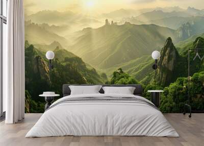 panoramic photo of an incredible mountain vista at sunrise, with rocky peaks and lush green valleys, with hikers Wall mural