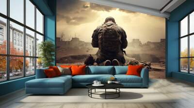 soldier praying in military battle field Wall mural