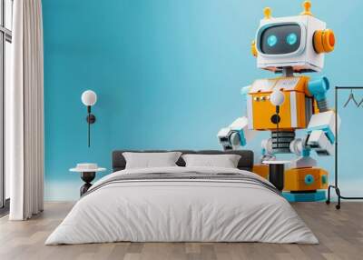 Cute robot toy on blue background. Wall mural