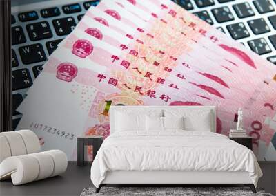 Yuan or RMB, Chinese Currency on laptop's keyboard Wall mural