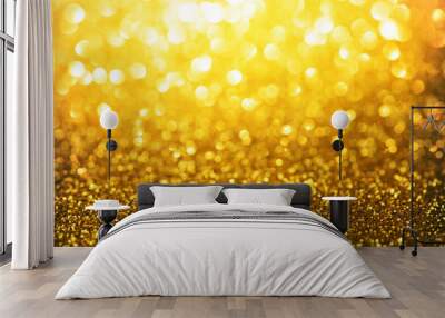 Sparkling or shimmering gold background. Micro gold glitter with intense sparkle. Good christmas and gift season background. Soft focus. Wall mural