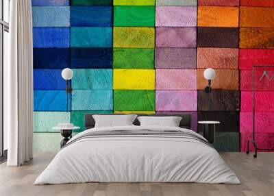 Spectrum of multi colored wooden blocks aligned. Background or cover for something creative or diverse. Wall mural