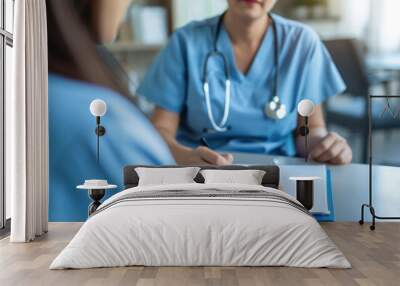 A hospital administrator interviewing a nurse for a healthcare staffing position. Wall mural