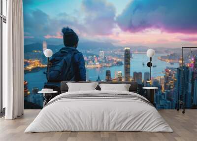 A traveler marveling at the view of a bustling city skyline.  Wall mural