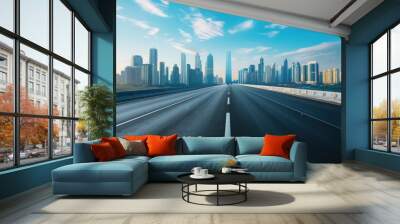 bird's eye view of an empty highway road leading to a futuristic tech city with tall skyscrapers in the distance on a sunny day Wall mural