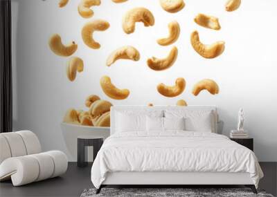 Falling cashew nuts in a bowl isolate on transparency background Wall mural