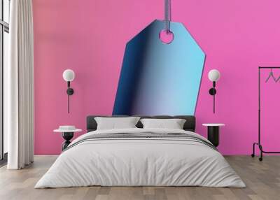 A vibrant hanging tag with a gradient effect, suspended against a pink background. Wall mural