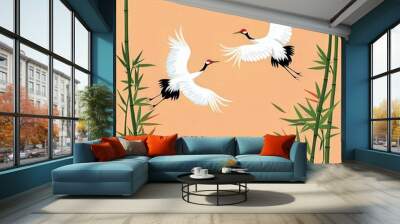 Two elegant cranes soar among lush bamboo, embodying grace and tranquility against a serene peach background. Wall mural