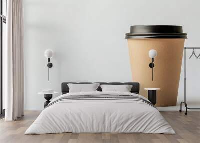 A brown paper coffee cup with a black lid on a white background. Wall mural