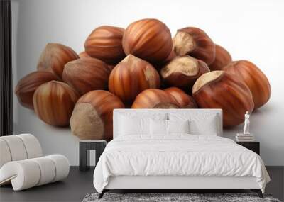 A pile of hazelnut with brown shells. Wall mural