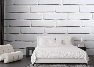 A textured white brick wall, providing a clean and modern background. Wall mural