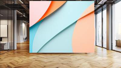 Abstract background with pastel pink, blue, and orange paper sheets arranged in a wave pattern. Wall mural